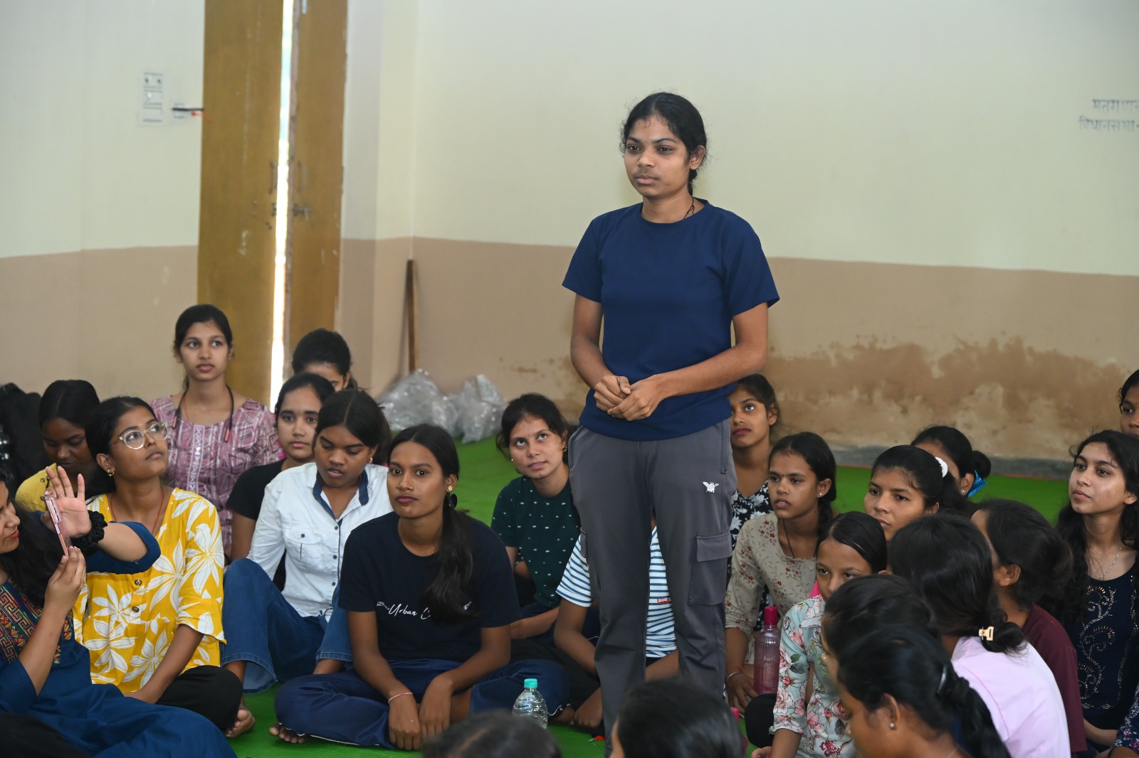 A mentor sitting alongside, not in front.