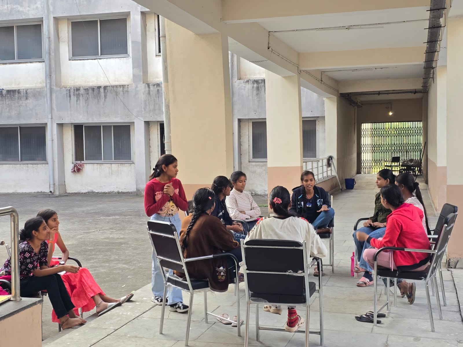 Mentor and learner - a long conversation by a window.